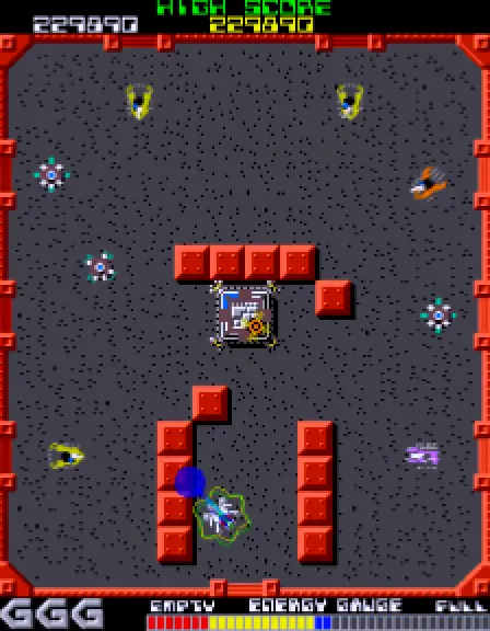 グロブダーのプレイ中の画面。上に「HIGH SCORE」とスコア、灰色の地のコロシアムに赤いブロックと敵、下に小さな字で「EMPTY」「ENERGY GAUGE」「FULL」と色の帯